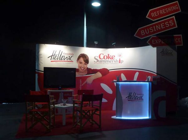 Pop up baner i promo pult Coca Cola stand